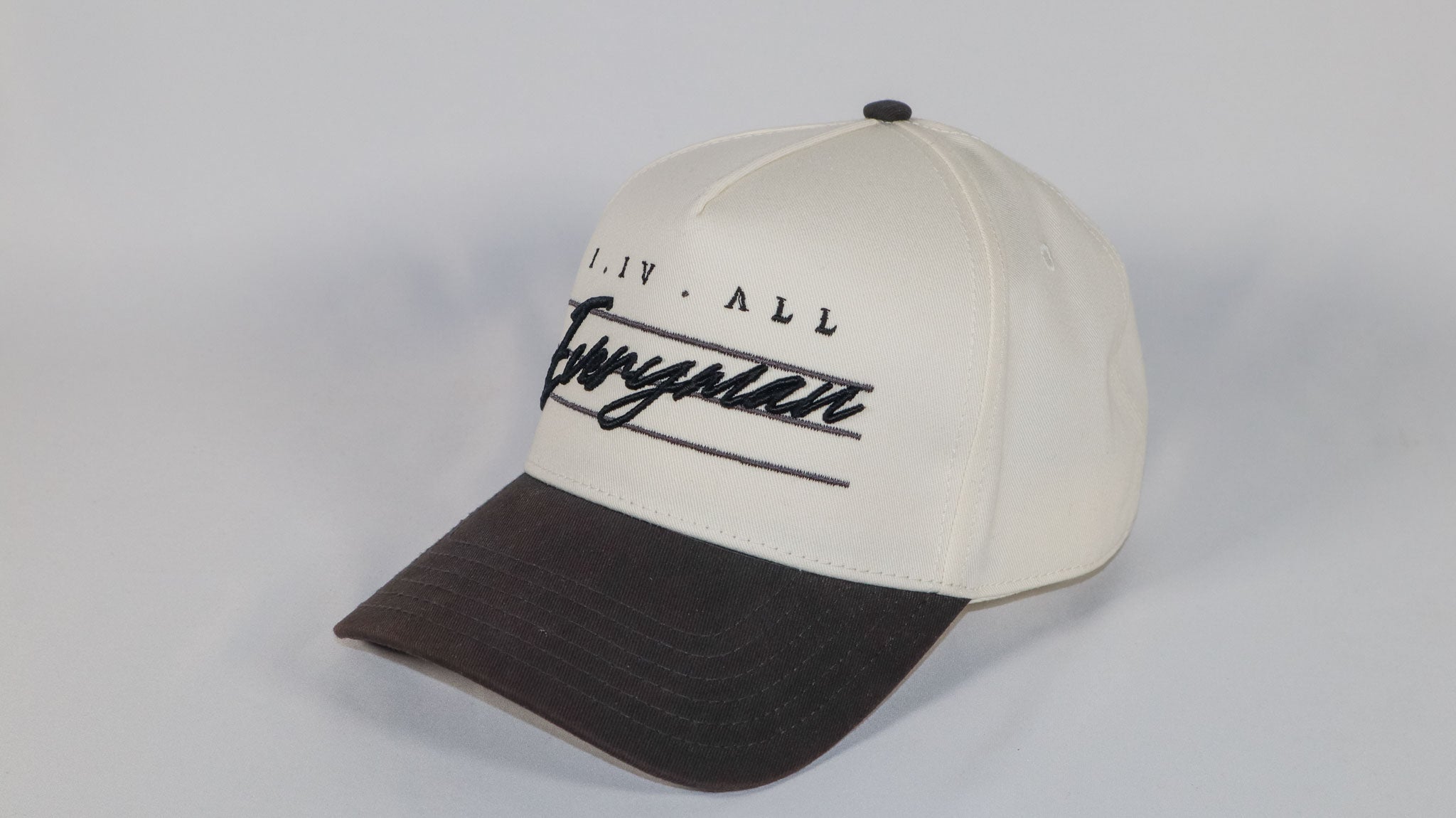 Everyman Script Snapback Hat