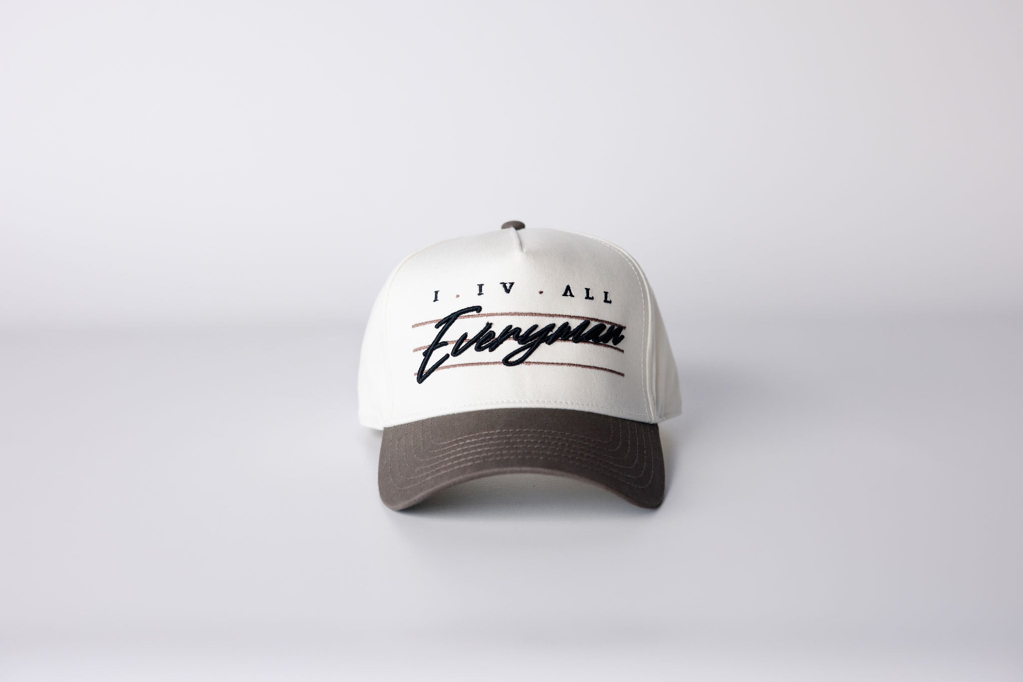 Everyman Script Snapback Hat
