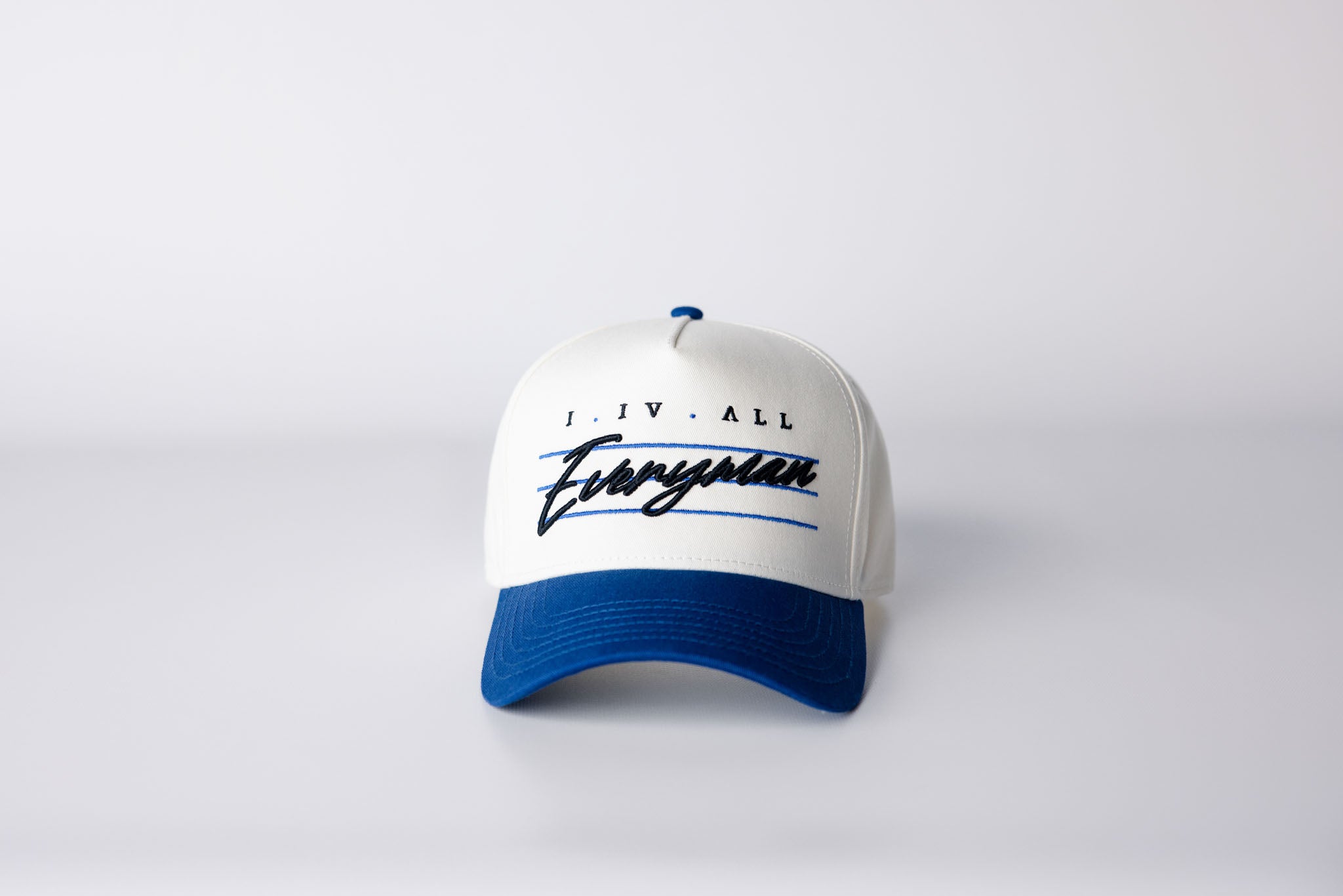 Everyman Script Snapback Hat